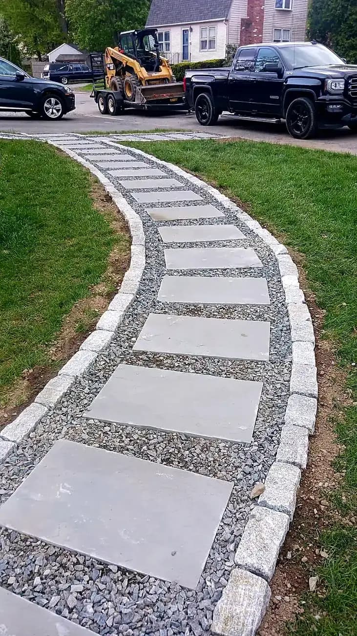 Bluestone walk with granite cobble edging